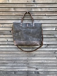 Image 3 of Tote bag in grey brown waxed canvas with leather bottom and cross body strap