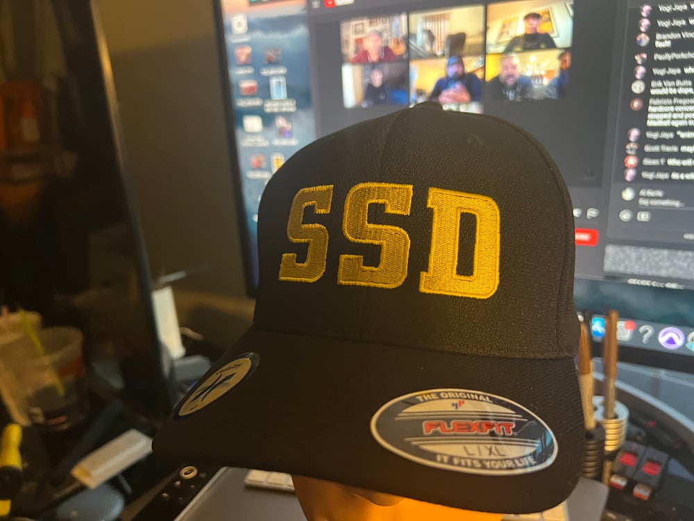 Black Flexfit hat with Solid Yellow SSD Logo