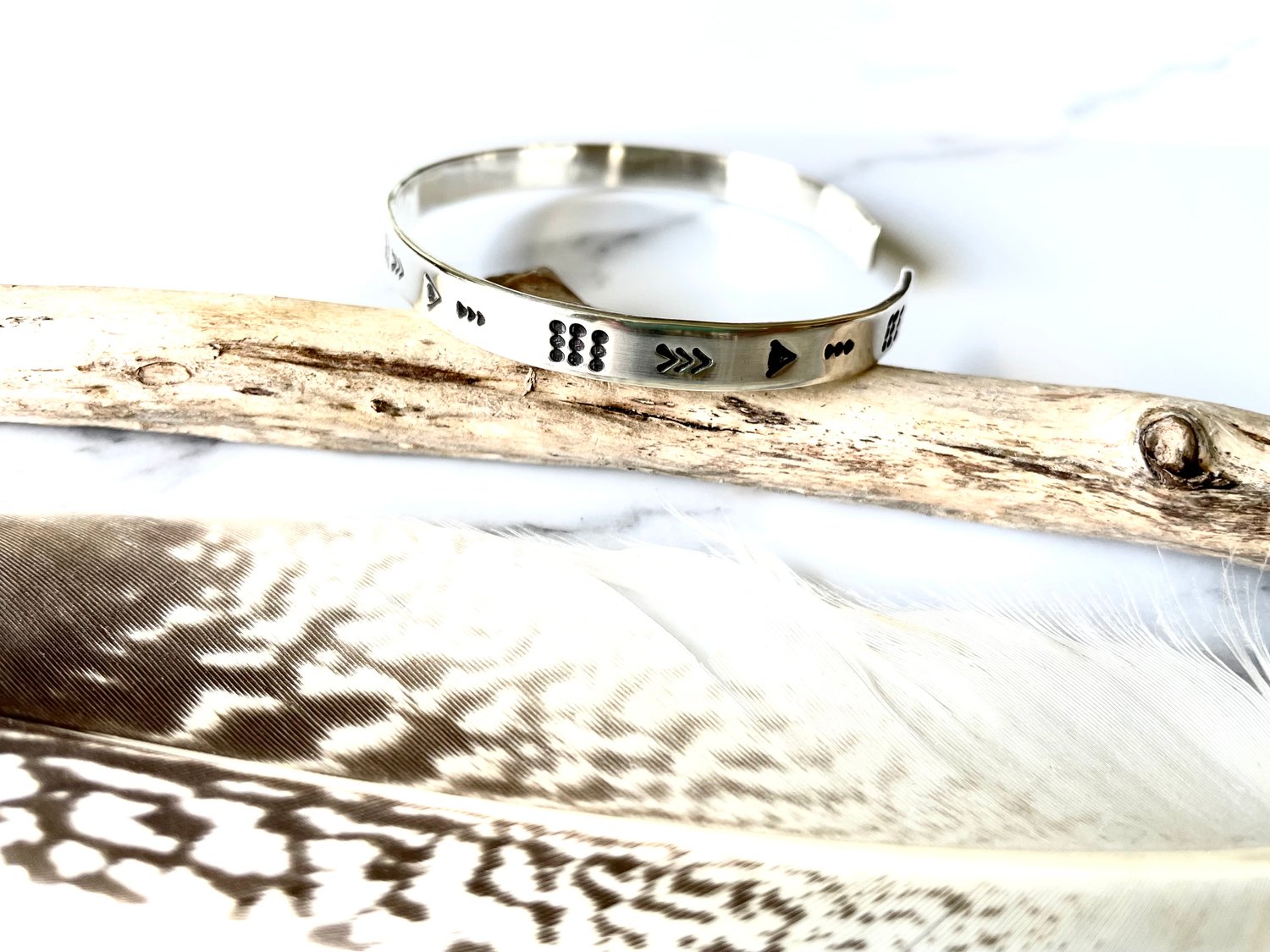 Image of Luna symbol silver stamped cuff bracelet. Handmade crescent moon patterned bracelet (6mm)