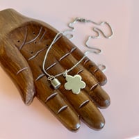 Image 1 of Silver flower and barrel lock necklace