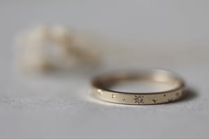 Image of 18ct Yellow gold 2mm ‘Star' Eternity ring