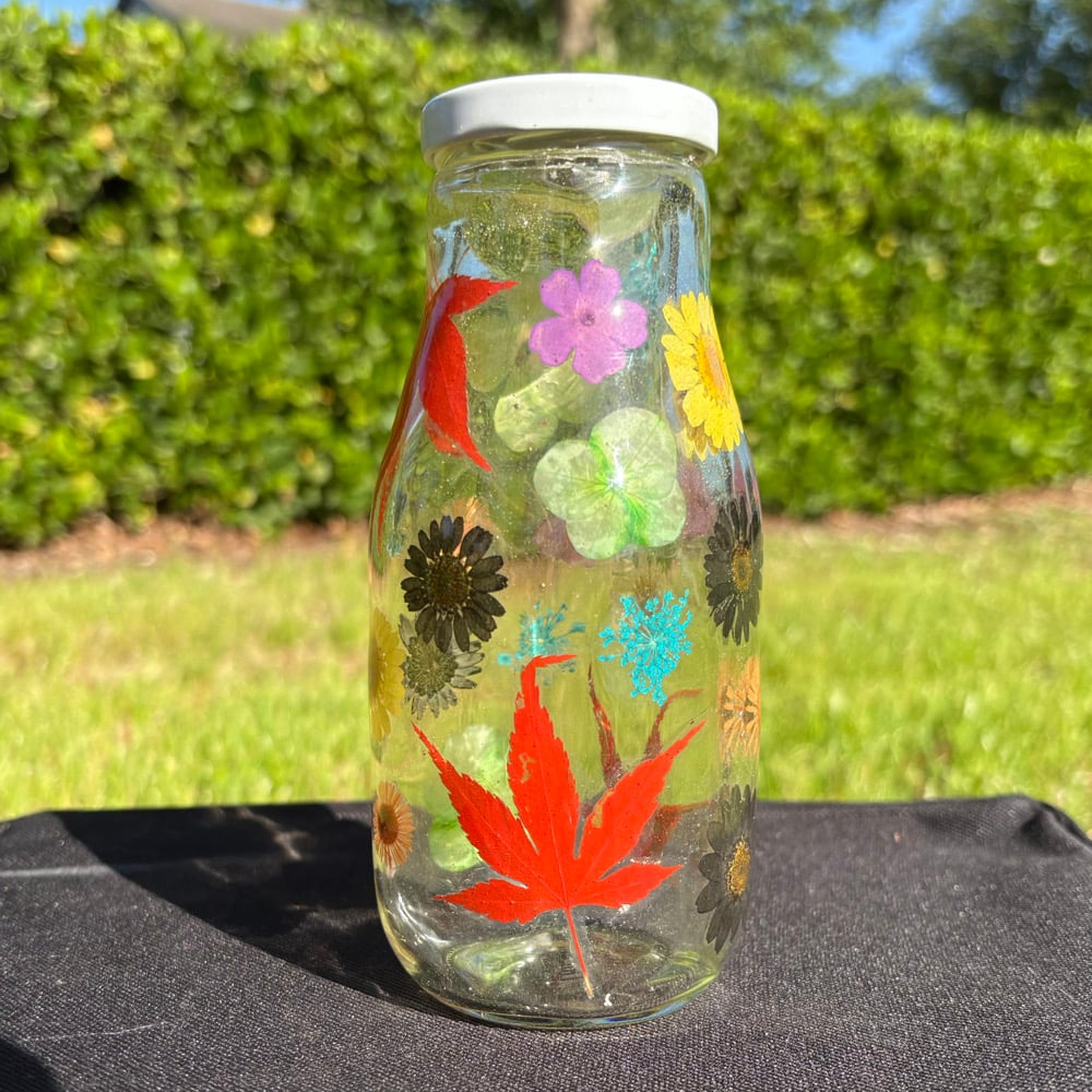 Image of rainbow floral milk jug