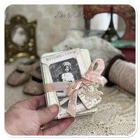 Image 1 of Vintage white tin with snippet book and lace samples