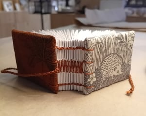 HOZAN — mini livre