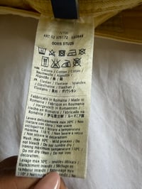 Image 5 of Vintage Y2K low rise yellow shorts with graphic and stud details