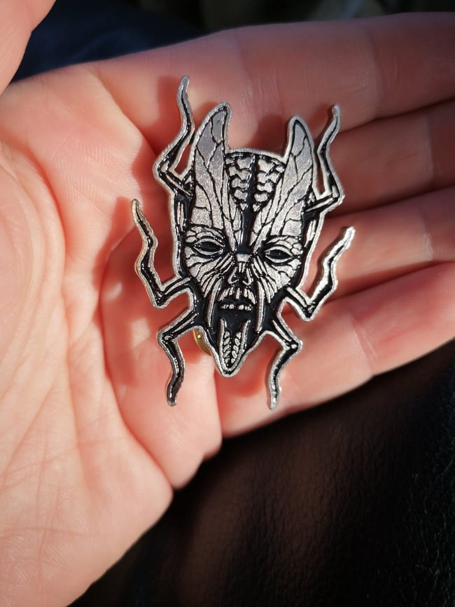 "Metamorph" Metal Pin