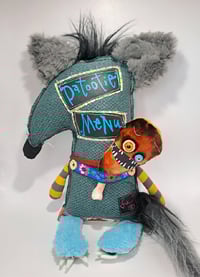 Image 2 of "Benson" the wolf and "George" the chicken leg 