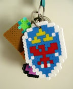 Image of 8-Bit Legend of Zelda Hylian Shield Keychain