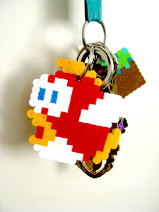 Image of 8-Bit Mario Fly Fish Keychain