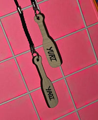 Image 2 of reversible paddle charm