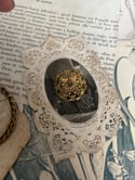 Broche en pomponne, cuivre et zircon, du XIXème siècle 