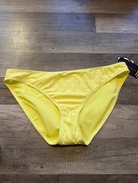 yellow and polka dot swim bottoms