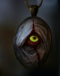 Image 5 of Pennywise Eye glow in the dark pendant OOAK