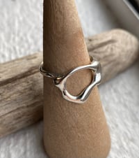 Image 1 of Liquid ‘0’ style 2