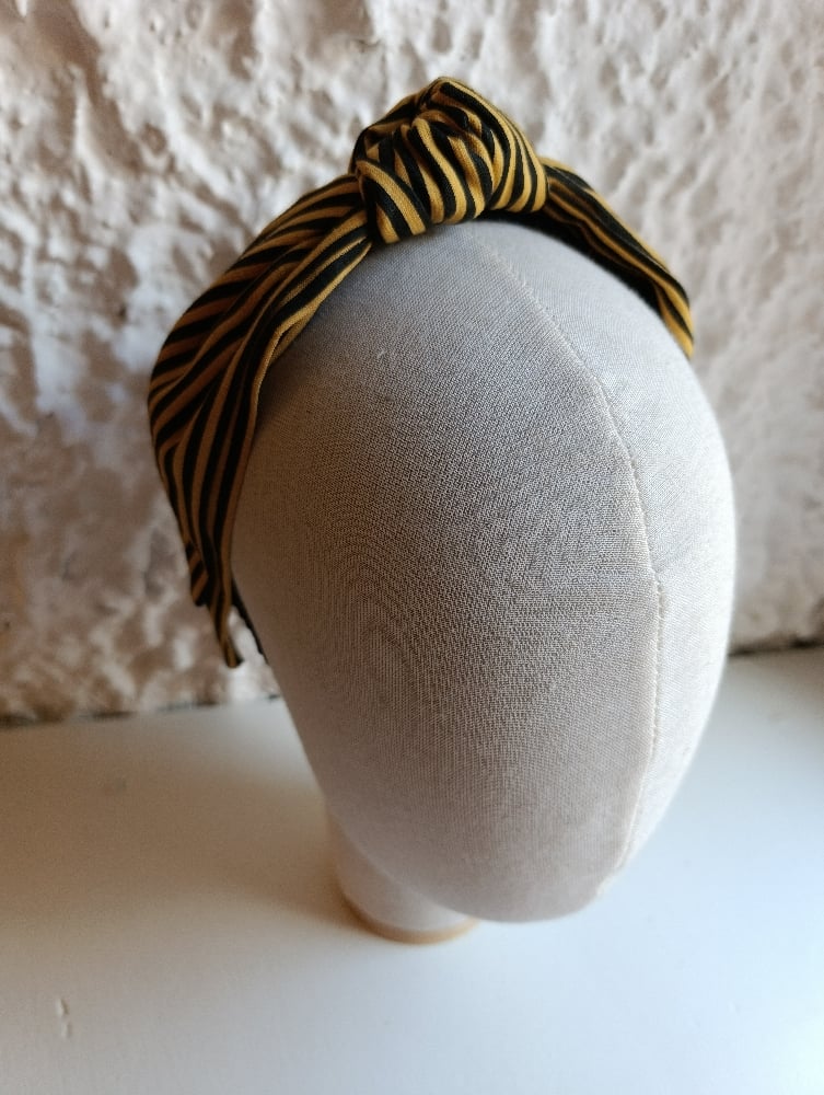 Image of Cerchietto a fascia a righe giallo/nero
