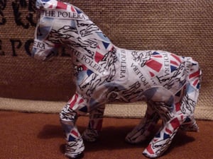 Image of "TP" and his herd need homes