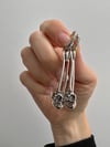 SAFETY PIN SKULL EARRINGS 