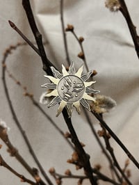 “Sun” Pin 