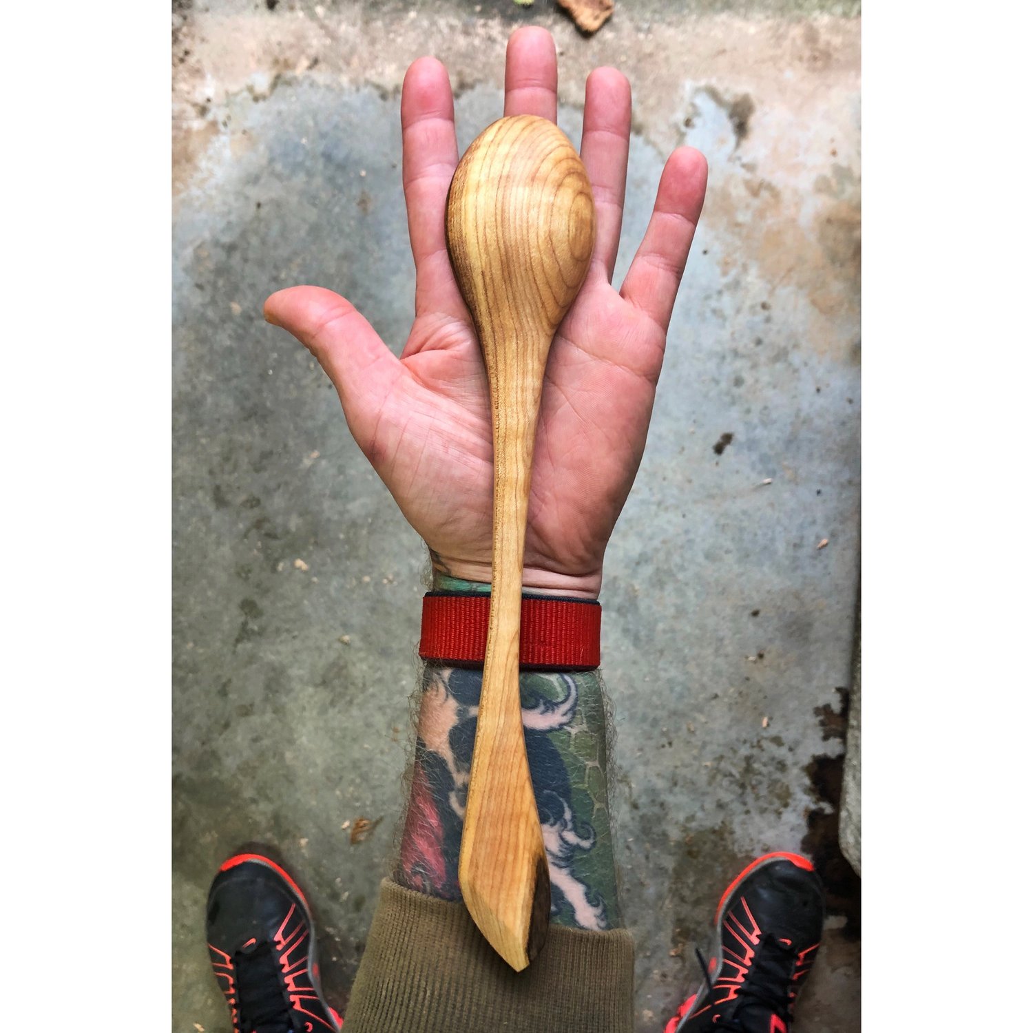 Image of Curly Maple Cook Spoon w/ wee bit of live edge on the handle 