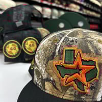 Image 1 of New Era 9Fifty Black Real Tree Trucker 40yrs