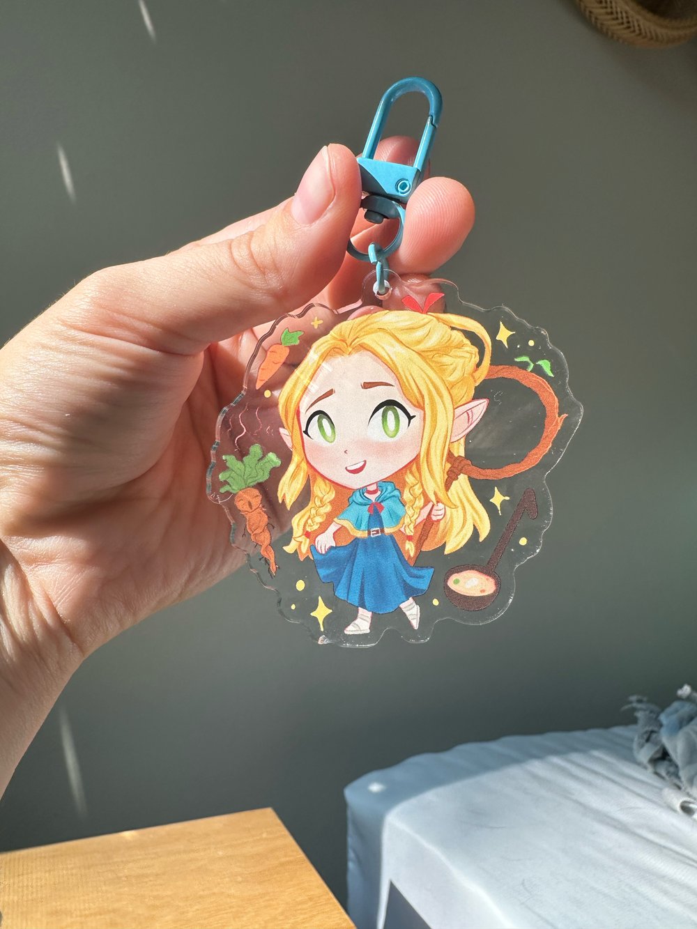 Image of Dungeon Meshi Marcille Double Sided Acrylic Keychain 2.5”