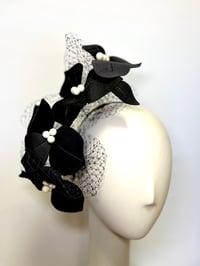 Image 1 of Black silk flower headpiece.