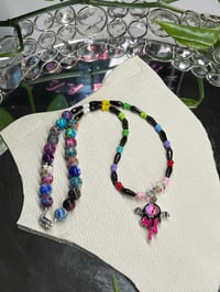 Black June 25 Rainbow Dragon Eye Drip 