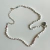 pearl and three charm necklace