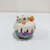 Image 3 of Glow in dark orange cat in witch brew cauldron ceramic keepsake (rainbow effect)