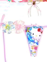 Image 5 of tanned hellokitty in the beach ball game