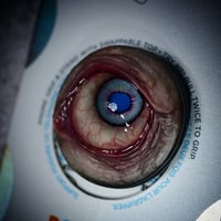 Image 15 of Custom Swappable Phone Grip for smartphones, bright blue reflective pupil, glow in the dark 