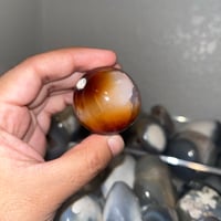Image 1 of Carnelian x Orca Agate Sphere