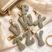 Image 1 of Light Blue Glow Letter Keychain • Personalized Resin Charm