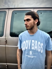 Image 4 of ‘Body Bags’ Light Blue Tee