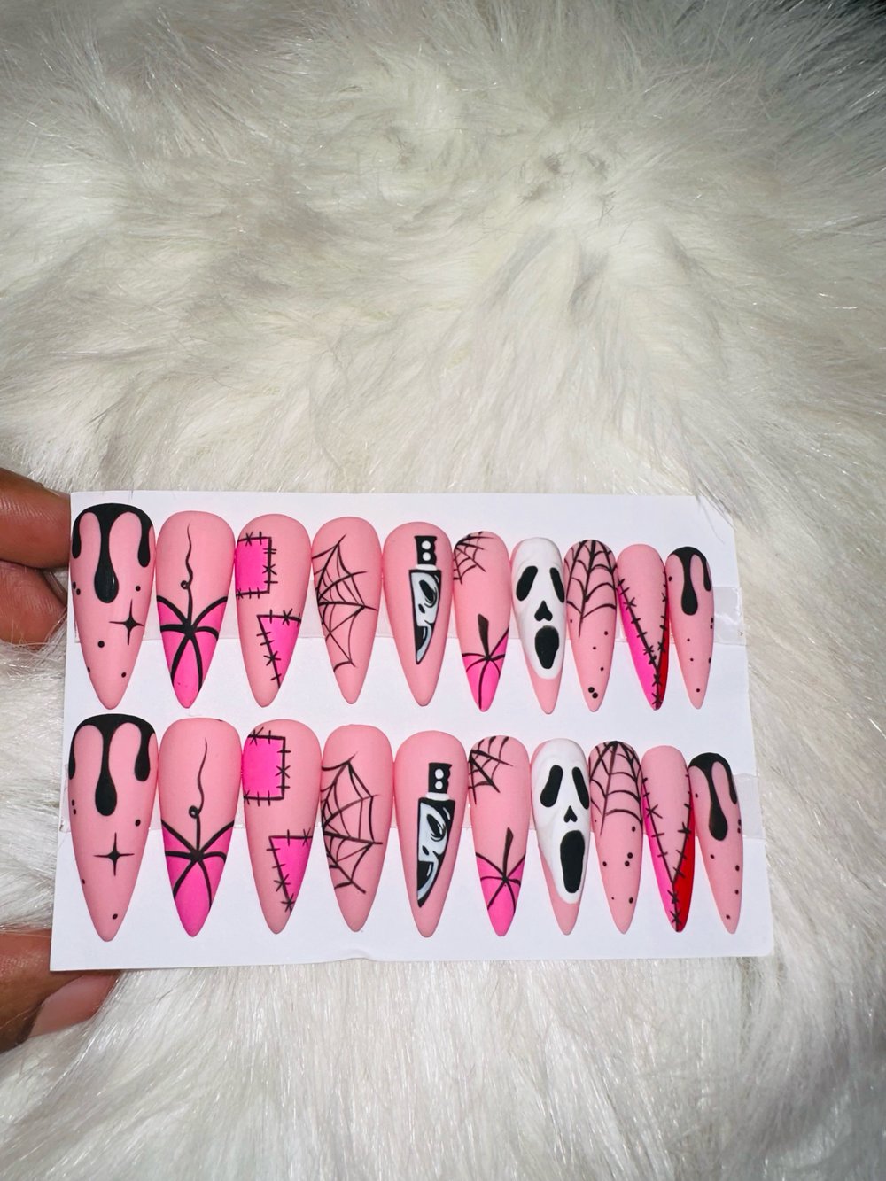 Image of 20 piece one size fits all Scream long stiletto press on nails