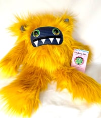Image 1 of Plush Yellow Furball 