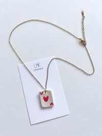Collier pendentif as de cœur céramique