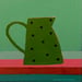 Image of Green Jug on Stripes