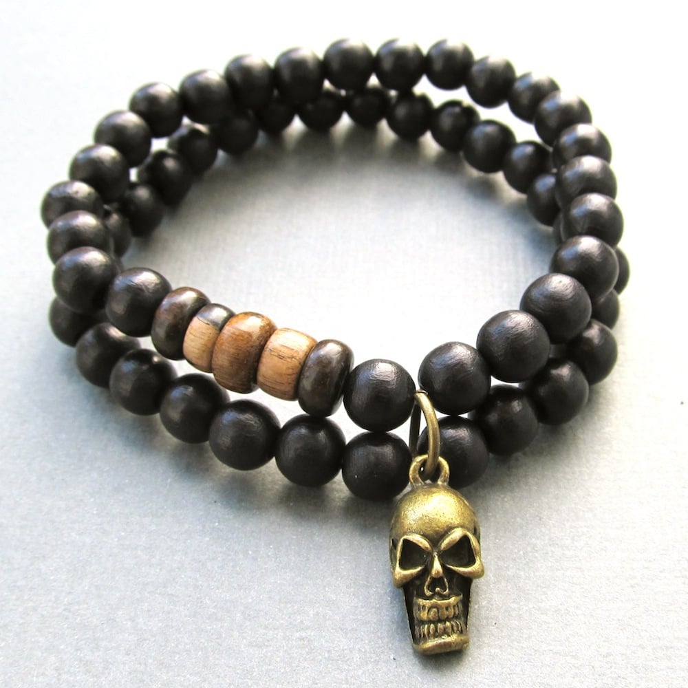 Image of Double black beaded stretch bracelets with skull charm