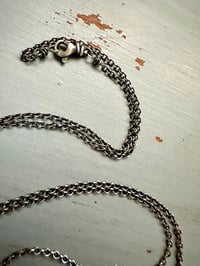 Image 13 of sterling silver moon pendant with courage inscription