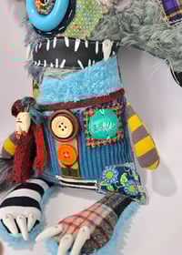 Image 3 of "Benson" the wolf and "George" the chicken leg 