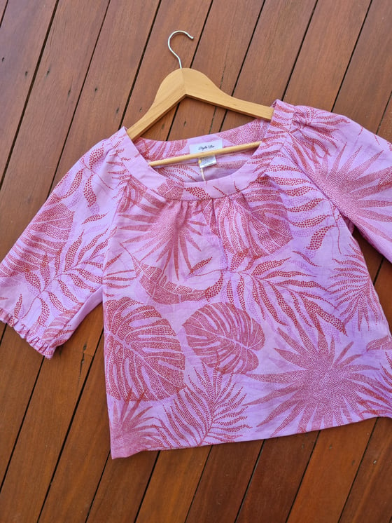 Image of TUNIC TOP in TROPICAL LILAC. Size Small & Large