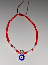 Image 2 of Red/White blue evil eye bracelet 