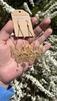 Image 3 of White Light Butterfly Sun Earrings ✨🤍🌞