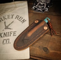 Image 2 of BROKEN ARROW • blue with black web