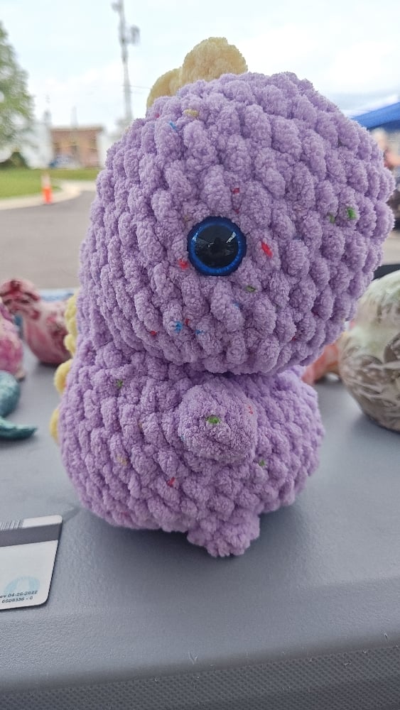 Image of Plush Purple Crochet Dinosaur – Handmade Amigurumi Dino Toy with Yellow Spikes