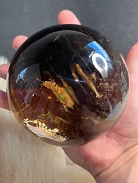 Image 11 of Golden Rutile In Smoky Quartz Sphere #1769