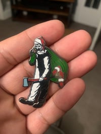 Image 2 of Terrified Santa pin & sticker pack