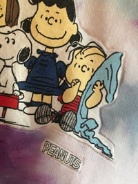 Image 2 of Upcycled “Peanuts” tie dyed hoodie