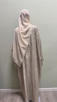 Image 1 of Korean shimmer fabric Puff sleeve abaya close comes with a matching scarf 